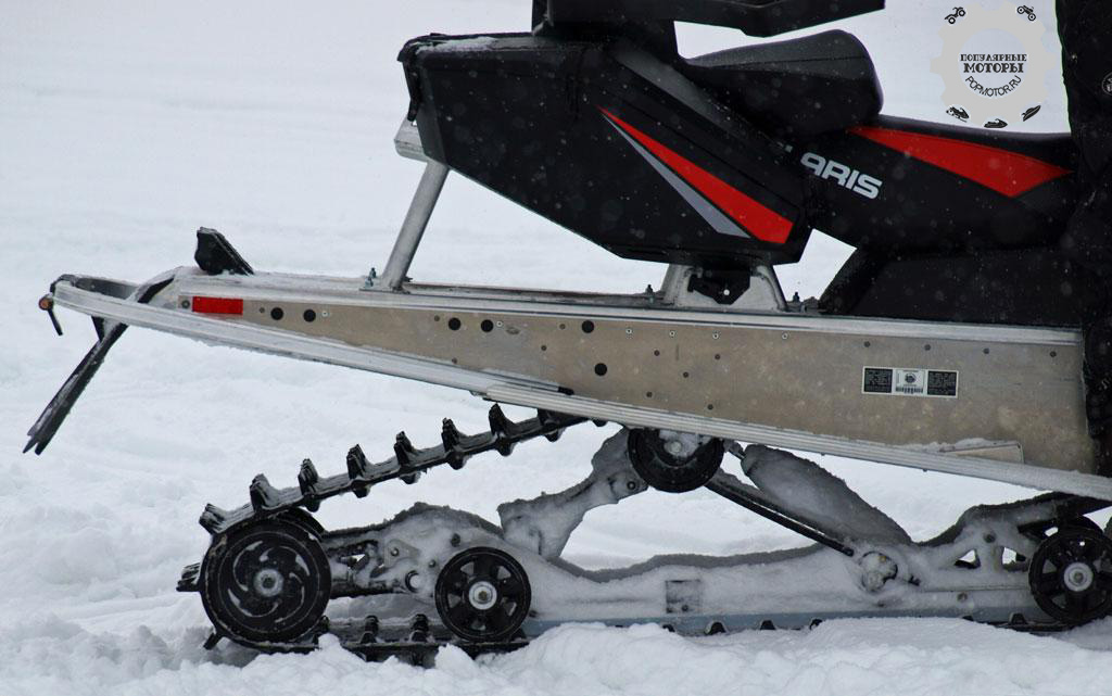 Фото снегохода Polaris 550 Indy Adventure 155 2015 — задняя подвеска